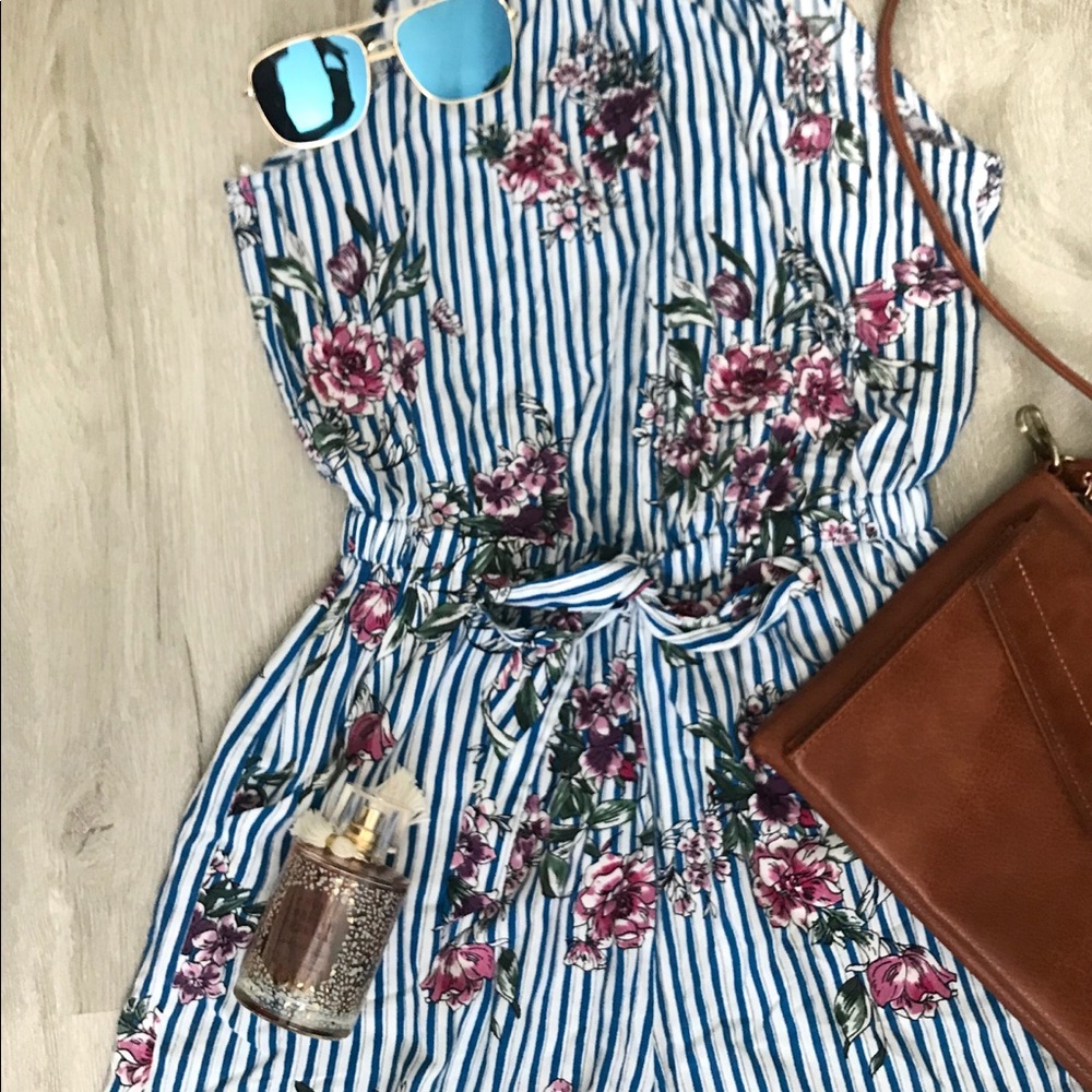 White romper with blue stripes and purple flowers